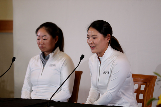Mina Harigae of the United States, left, and Ryu So-yeon speak during an event after the LPGA announced that the Hanwha Lifeplus International Crown will return to the schedule in 2023 at TPC Harding Park on Oct. 11 in San Francisco, California.  [GETTY IMAGES/LPGA]