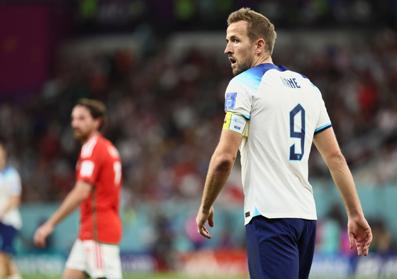 Harry Kane of England reacts during the Group B match between Wales and England at the 2022 FIFA World Cup at Ahmad Bin Ali Stadium in Al Rayyan, Qatar on Tuesday. [XINHUA/YONHAP]
