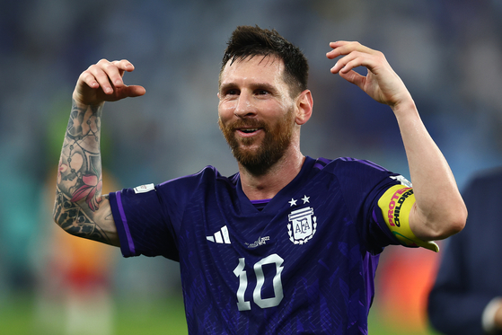 Lionel Messi of Argentina celebrates at full-time following the 2022 FIFA World Cup Group C match at 974 Stadium in Doha, Qatar on Wednesday. [UPI/YONHAP]