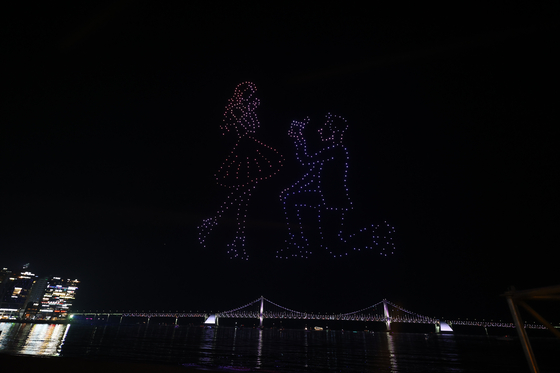 Gwangalli M Drone Light Show is shown above Gwangan Bridge in Busan. [KOREA TOURISM ORGANIZATION]