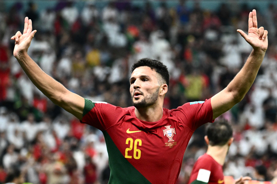 Portugal's Goncalo Ramos celebrates after scoring his team's fifth goal, his hat-trick, during a Qatar 2022 World Cup round of 16 match between Portugal and Switzerland at Lusail Stadium in Lusail, Qatar on Tuesday.  [AFP/YONHAP]