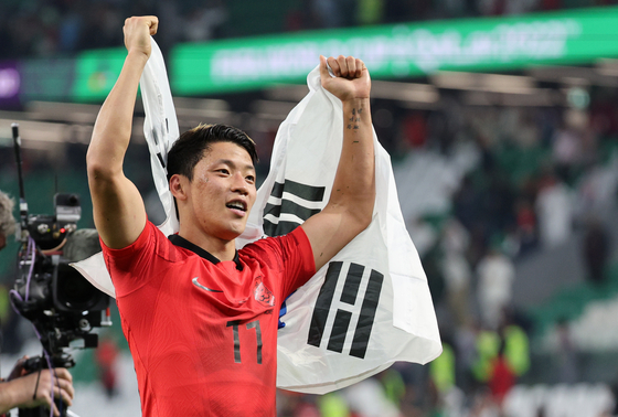 Hwang Hee-chan celebrates after scoring a winning goal against Portugal on Dec. 3, 2022. [NEWS1]