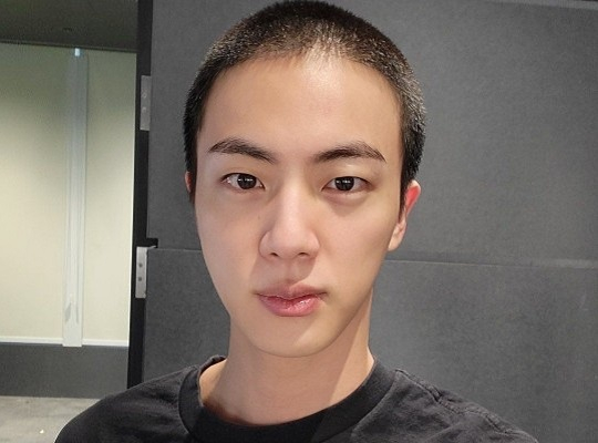 BTS's Jin posts picture with shaved head one day before enlistment