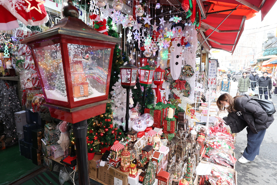Christmas-themed toys and stationery displayed at a shop in central Seoul on Tuesday. [YONHAP]