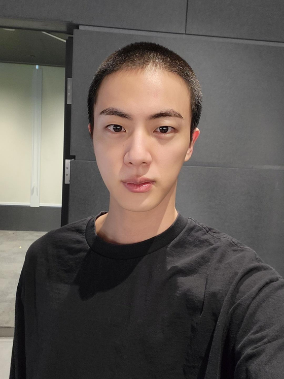 BTS's Jin in a photo uploaded on Weverse. [SCREEN CAPTURE]