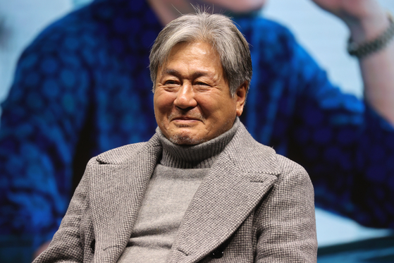 Choi Mu-sik smiles at a local press event to promote Disney+'s original drama series "Big Bet" at JW Marriott Dongdaemun Square Seoul in eastern Seoul on Wednesday. [YONHAP]