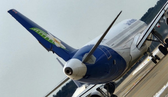The tail of a Lao Airlines plane was hit by an Air Premia plane on Monday while it was awaiting take-off at Incheon International Airport. There were 118 passengers aboard the Lao Airlines plane at the time, but no injuries were reported, Incheon International Airport said. [YONHAP]