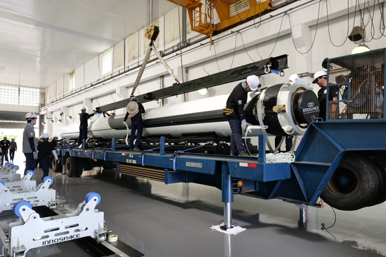 Innospace's Hanbit-TLV test rocket is being examined before the launch, which was rescheduled from Monday to Tuesday at the Alcantara Launch Center in northern Brazil. [INNOSPACE]