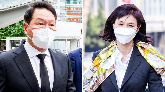 Chey Tae-won, left, chairman of SK Group, and his wife Roh Soh-yeong. [YONHAP]