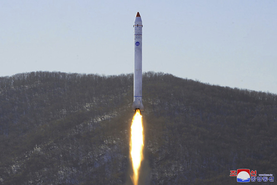 This photo provided by North Korea's state media Korean Central News Agency, shows what it says a test of a rocket with the test satellite at the Sohae Satellite Launching Ground in North Korea on Dec. 18, 2022. [AP/YONHAP]
