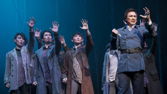 Jung Sung-hwa, far right, and the ensemble of musical "Hero" performs on stage in 2015 [JOONGANG ILBO]