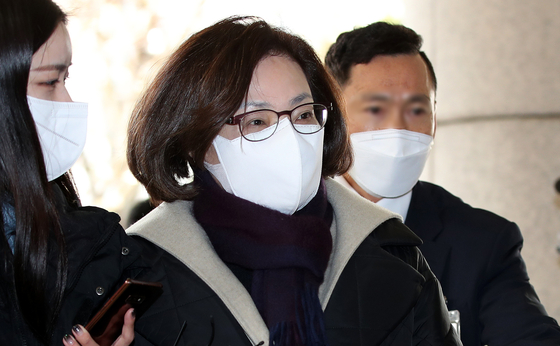 Park Hee-young, head of the Yongsan District Office, is questioned by reporters at the Seoul Western District Court on Monday where a hearing on her arrest warrant was held. [NEWS1]