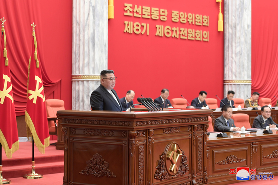 North Korean leader Kim Jong-un attends the sixth enlarged meeting of the eighth Central Committee of the Workers' Party of Korea in Pyongyang on Dec. 26 to discuss next year's policy direction, in this photo released by the North's official Korean Central News Agency the next day. [YONHAP]
