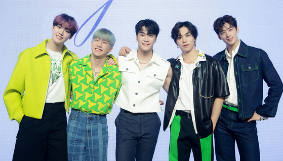 Astro members, excluding MJ who enlisted in the military for his mandatory service earlier this year, pose for cameras during a press event for its third full-length album ″Drive to the Starry Road″ (2022) in May. [FANTAGIO]
