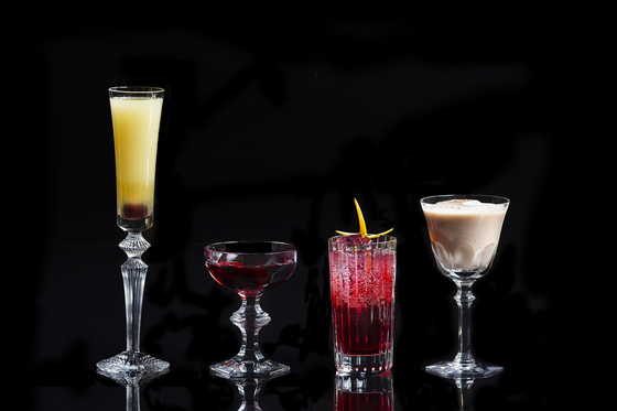 Cherry Manhattan (second from left) and Chestnut Eggnog (far right) are part of the seasonal menu at Charles H. bar inside Four Seasons Hotel in Jongno District, central Seoul [FOUR SEASONS HOTEL SEOUL]   