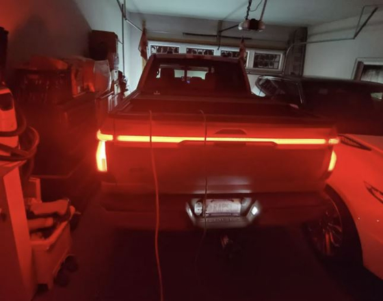 A Ford F-150 Lightning truck is shown being used to power a house. [SCREEN CAPTURE]