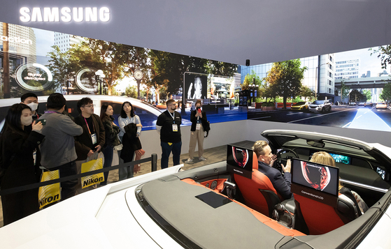 Visitors experience the Ready Care service at Samsung Electronics' booth at CES 2023 in Las Vegas. [YONHAP]