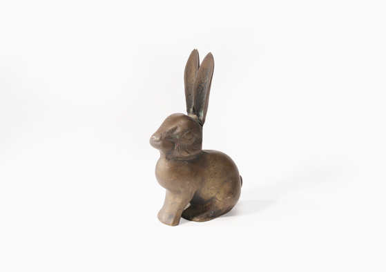 A wooden ornament depicting a rabbit among the 12 Zodiac animals. [NATIONAL FOLK MUSEUM OF KOREA]