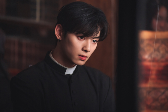 Actor and singer Cha Eun-woo as Vatican priest Yohan in ″Island.″ [TVING]