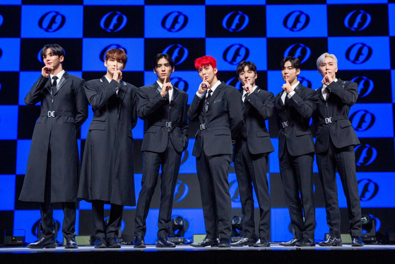 SF9 poses during Monday's showcase. [FNC ENTERTAINMENT]