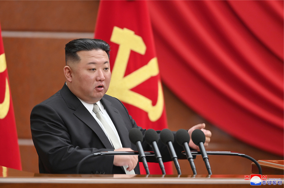 North Korean leader Kim Jong-un speaks at a plenary meeting of the ruling Workers' Party of Korea, raising the need to exponentially increase the number of its nuclear arsenal, on Jan. 1, [KOREAN CENTRAL NEWS AGENCY]