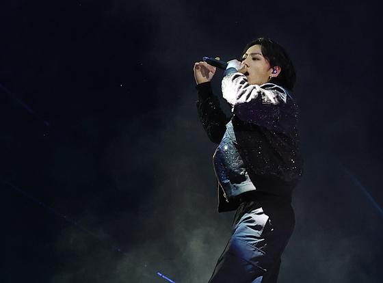 Jungkook performs at the opening ceremony for the 2022 Qatar World Cup. [YONHAP]