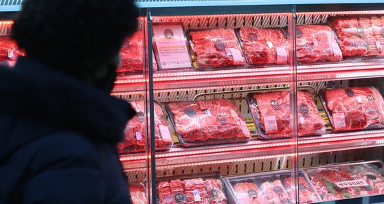 A person passes by a meat store in Seongdong District, eastern Seoul, on Thursday. [NEWS1]