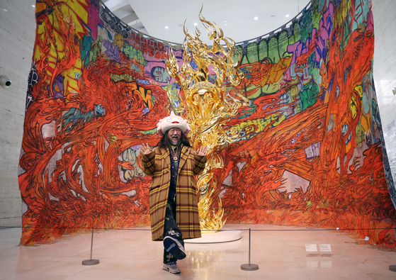 Renowned Japanese contemporary artist Takashi Murakami poses at the Busan Museum of Art on Thursday during the opening of "MurakamiZombie," a large-scale retrospective of the artist now on view. [YONHAP]