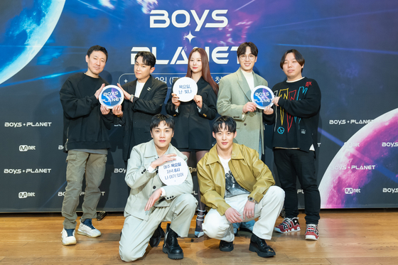 Celebrity coaches pose during the online press conference for "Boys Planet" on Feb. 2, 2023. [MNET]