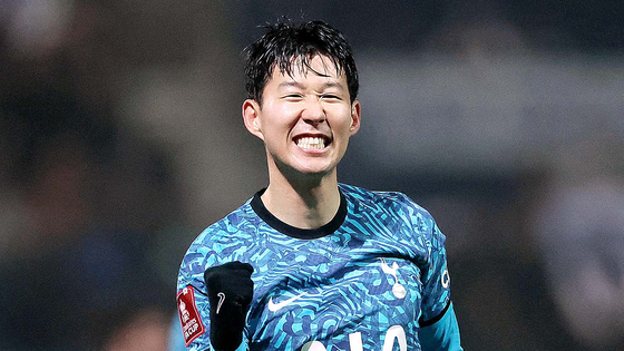 Tottenham Hotspur's Son Heung-min celebrates after scoring his second goal against Preston at Deepdale in Preston, England on Saturday.  [REUTERS/YONHAP]