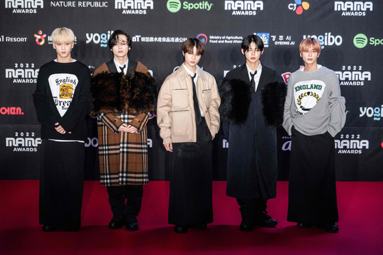 Boy band Tomorrow X Together attends a red carpet event at the 2022 Mama Awards in Osaka on Nov. 29, 2022. [AFP/YONHAP]