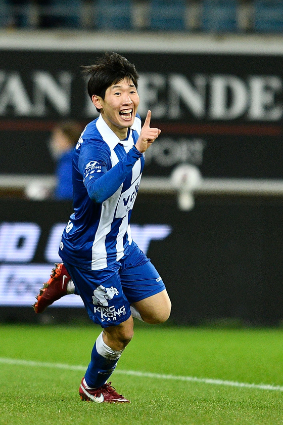 K.A.A. Gent's Hong Hyun-seok celebrates after scoring a goal during a Belgian Pro League match against Genk in Ghent on Sunday.  [AFP/YONHAP]