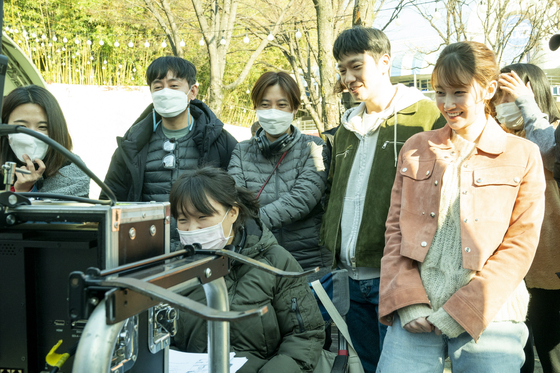 Production staff and actors on the set of ″Nothing Serious″ on Nov. 24, 2021. [CJ ENM]