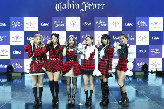 Girl group Purple Kiss poses for cameras at the showcase for its fifth EP ″Cabin Fever″ on Wednesday [RBW]