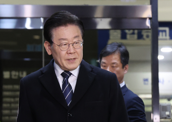 Democratic Party leader Lee Jae-myung exits Seoul Central Prosecutors' Office after being investigated on the land development project scandal on Feb. 10. [YONHAP]