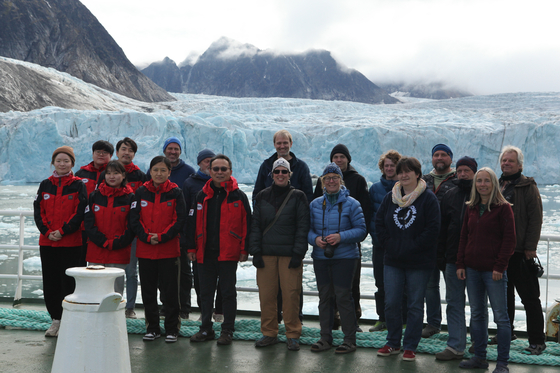 Matthias Forwick, back row center, professor of marine geology and head of Department of Geoscience at the Arctic University of Norway in Tromso, and Nam Seung-il, on his left in the first row, principal investigator of research on Arctic paleoceanography and Svalbard fjords at the Korea Polar Research Institute, during an expedition in Magdalenefjorden on July 31, 2022 [NAM SEUNG-IL] 