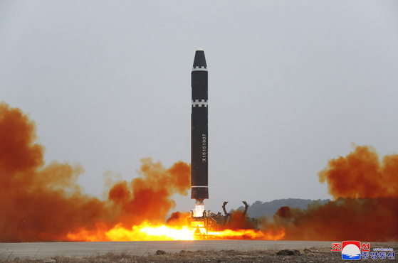 A photo released by the official North Korean Central News Agency (KCNA) shows the launching of a Hwasong-15 intercontinental ballistic missile (ICBM) at Pyongyang International Airport in North Korea on Saturday. [EPA/YONHAP]