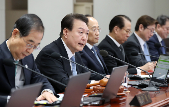 President Yoon Suk Yeol at his cabinet meeting on Tuesday comments on the labor unions and their refusal to disclose accounting. [YONHAP]