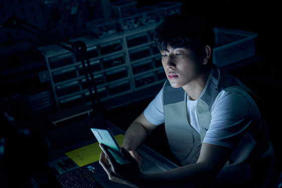 Actor Yim Si-wan during a scene of the new Netflix film ″Unlocked″ [NETFLIX]             