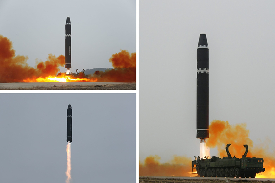 Photos released by the North’s official Korean Central News Agency (KCNA) Sunday show the launching of a Hwasong-15 intercontinental ballistic missile (ICBM) on Saturday. [NEWS1]