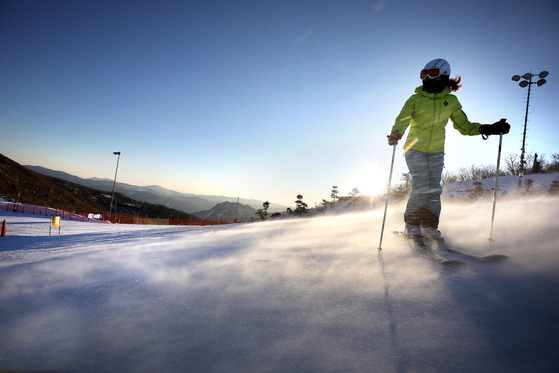 A skier climbs up the slope at Hi1 Resort. [HI1 RESORT]