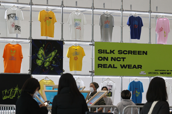 Visitors are able to purchase upcycled NCT stage outfits at the C.at Work Global Trend Festa 2023, which continues until Sunday at the Dongdaemun Design Plaza in eastern Seoul. [YONHAP]