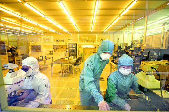 Students at Unist in Ulsan conduct research in the university’s UNIST Nano Fabrication Cleanroom. [Unist]