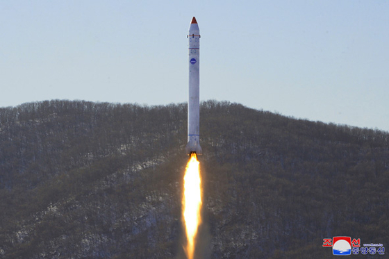 A photograph released by the North's Korean Central News Agency (KCNA) shows an ″important final-stage″ test of a satellite launch rocket being conducted at the Sohae Satellite Launching Ground in Cholsan, North Pyongan Province on Dec. 18, 2022. [YONHAP]