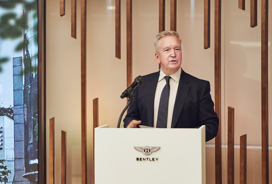 Bentley Motors Chairman and CEO Adrian Hallmark speaks during a press conference Wednesday celebrating the opening of Bentley Cube showroom in Gangnam District, southern Seoul. [BENTLEY MOTORS KOREA]