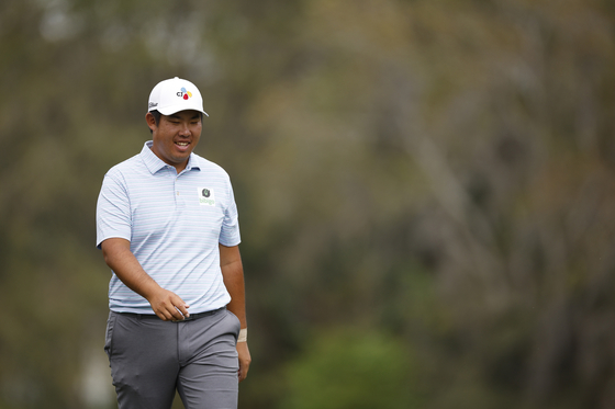 An Byeong-hun smiles on the 14th hole during the second round of The Players Championship on The Players Stadium Course at TPC Sawgrass in Ponte Vedra Beach, Florida on Friday.  [GETTY IMAGES]