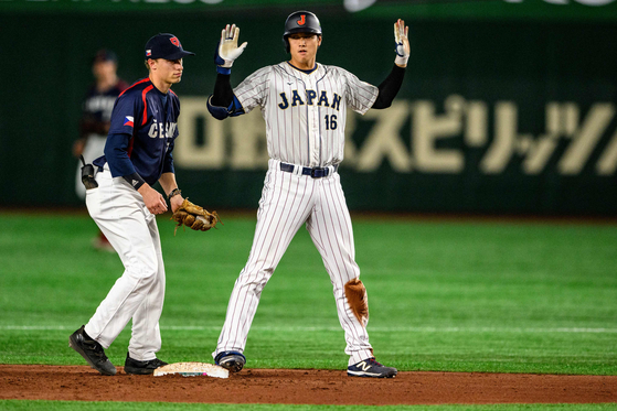 Japan's Shohei Ohtani reacts after reaching second base during a World Baseball Classic Pool B game against the Czech Republic at the Tokyo Dome in Tokyo on Saturday.  [AFP/YONHAP]