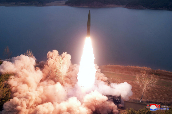 North Korea's official Korean Central News Agency (KCNA) releases photos on Wednesday showing the North firing two ground-to-ground ballistic missiles from Jangyon, South Hwanghae Province, on Tuesday. [KCNA]