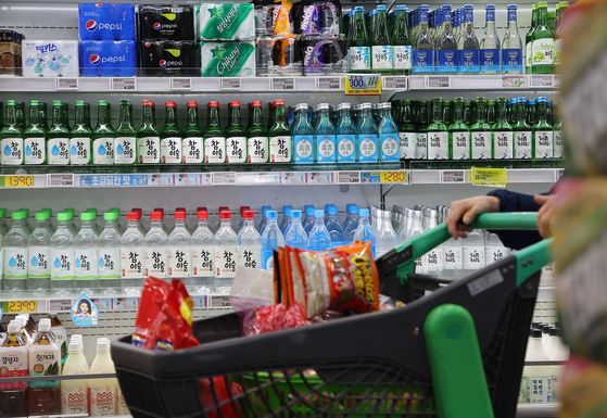 An array of soju brands lined up at a retail store in Seoul on Feb. 26. [YONHAP] 