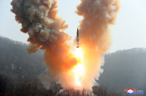 A photo released by the official North Korean Central News Agency (KCNA) on Monday showing a rocket launch during a tactical drill to bolster the country's war deterrence and nuclear counterattack capability at an undisclosed location in North Korea. [EPA/YONHAP]
